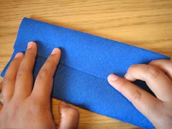 Doblar los extremos del cuadro hacia el centro