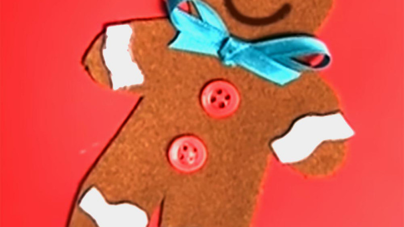 Tarjeta de felicitación con muñeco de jengibre en fieltro para la Navidad