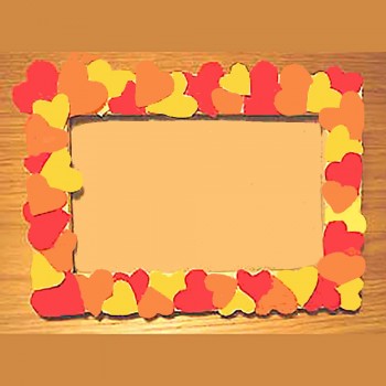 Un portafotos de corazones y del corazón para papá