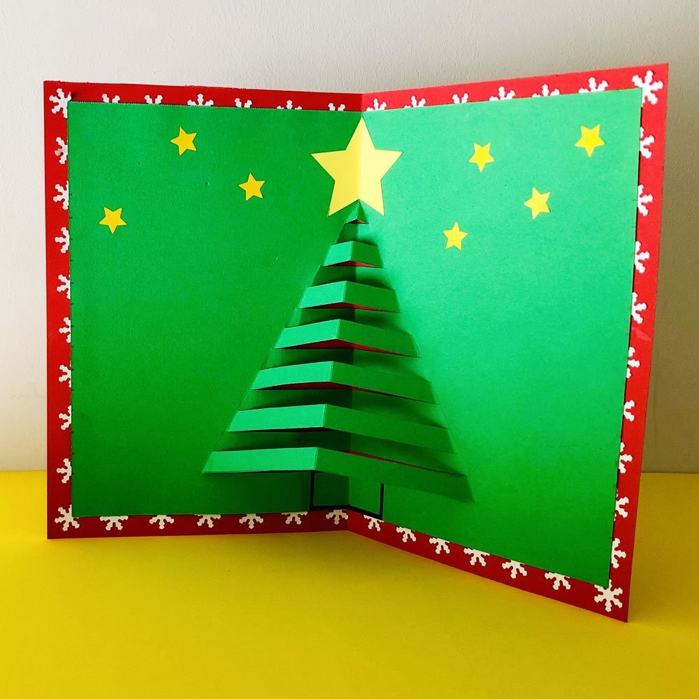 Tarjeta con árbol de Navidad 3D. Postal navideña pop up