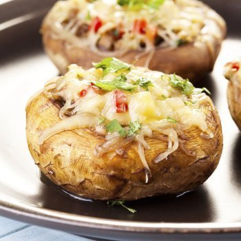 Champiñones con queso al horno