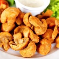 Champiñones rebozados o empanados. Receta casera para niños