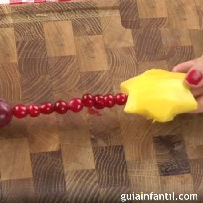 Pincho de estrella con mango. Postre de Navidad