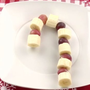 Bastón de plátano y uvas