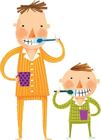 Padre con hijo se lavan dientes