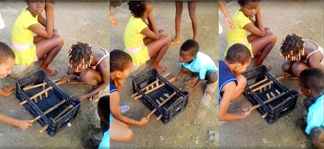 Un futbolín casero fabricado con una caja de frutas