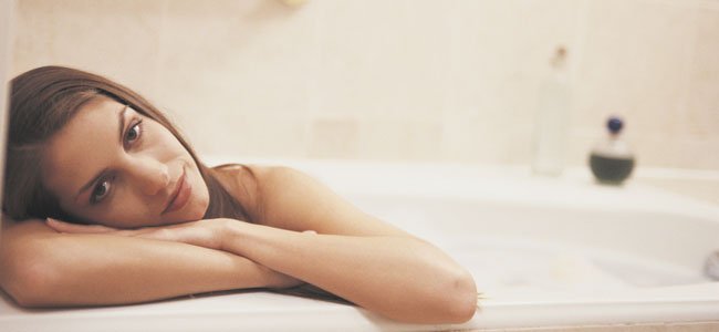 Mujer en bañera