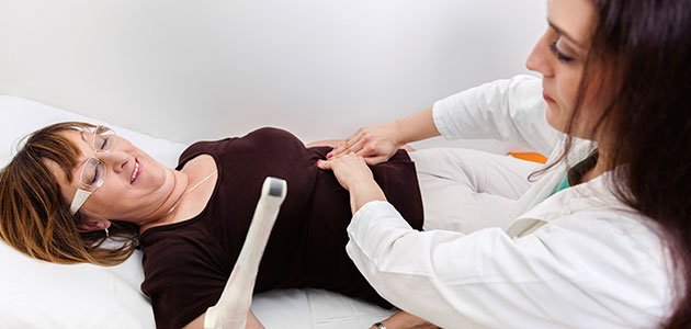 Revisiones tras el parto Mujer en revisión