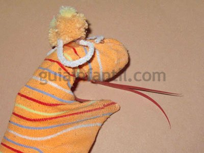 Cómo hacer una marioneta lagarto. Paso 5