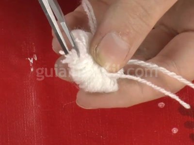 Cómo hacer un pompón de lana. Paso 4